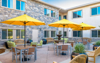 Outdoor view of courtyard with large umbrella covered seating